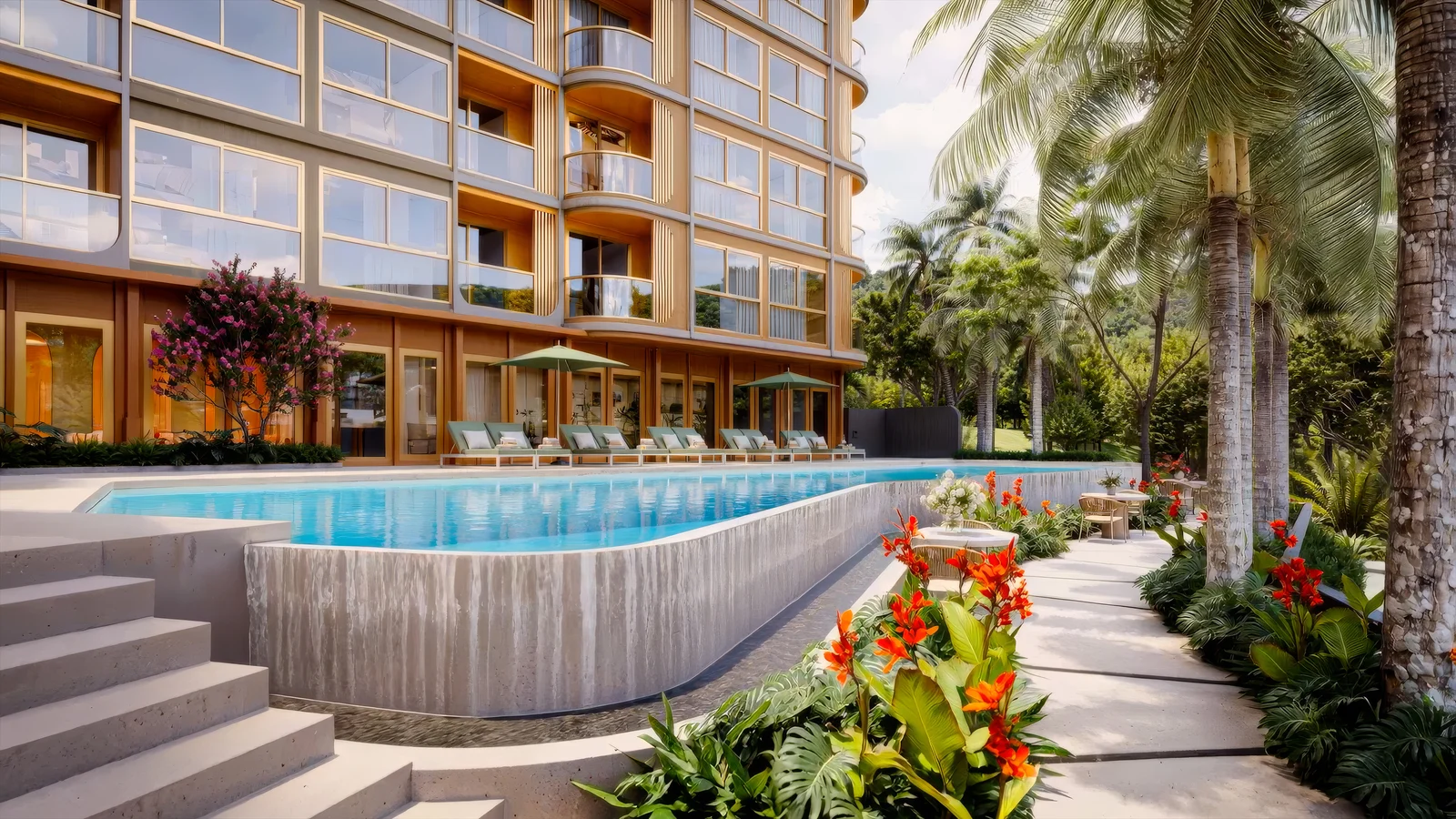 Pool deck with loungers and tropical planting